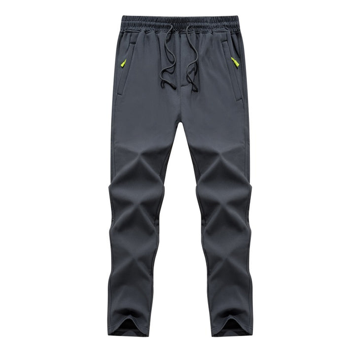 Men's Tapered Tech Jogging Pants with Elastic Waistband, Zipper Pockets, and Breathable Functional Material Mune Fashion
