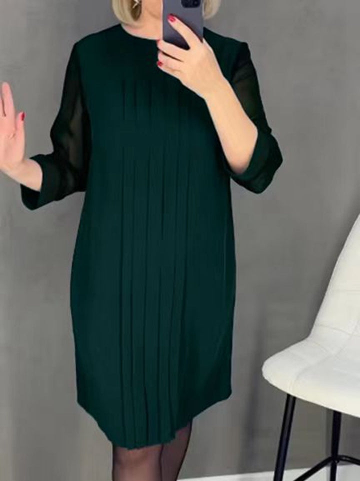 Ladies nan pleated sheath dress with knee-length silhouette and transparent three-quarter sleeves Mune Fashion