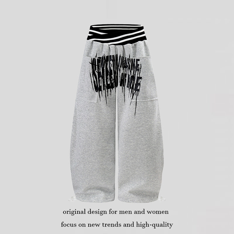 ladies culotte jogging pants with high-contrast waistband, patch pockets, and drawstring hem.