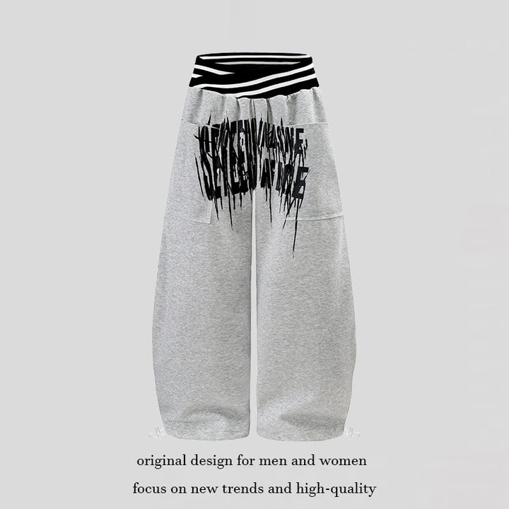 ladies culotte jogging pants with high-contrast waistband, patch pockets, and drawstring hem.