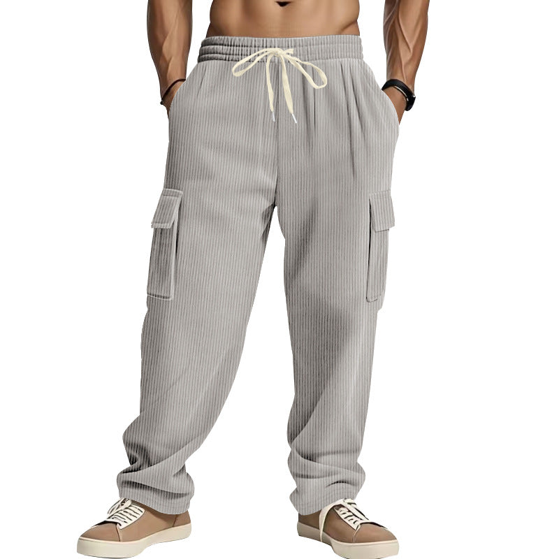 Men's corduroy cargo pants with wide leg, drawstring waistband, and patch cargo pockets