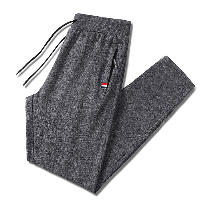Men's Slim-Fit Jogging Pants with Elastic Ribbed Waistband, Drawstring and Zipper Pockets Mune Fashion