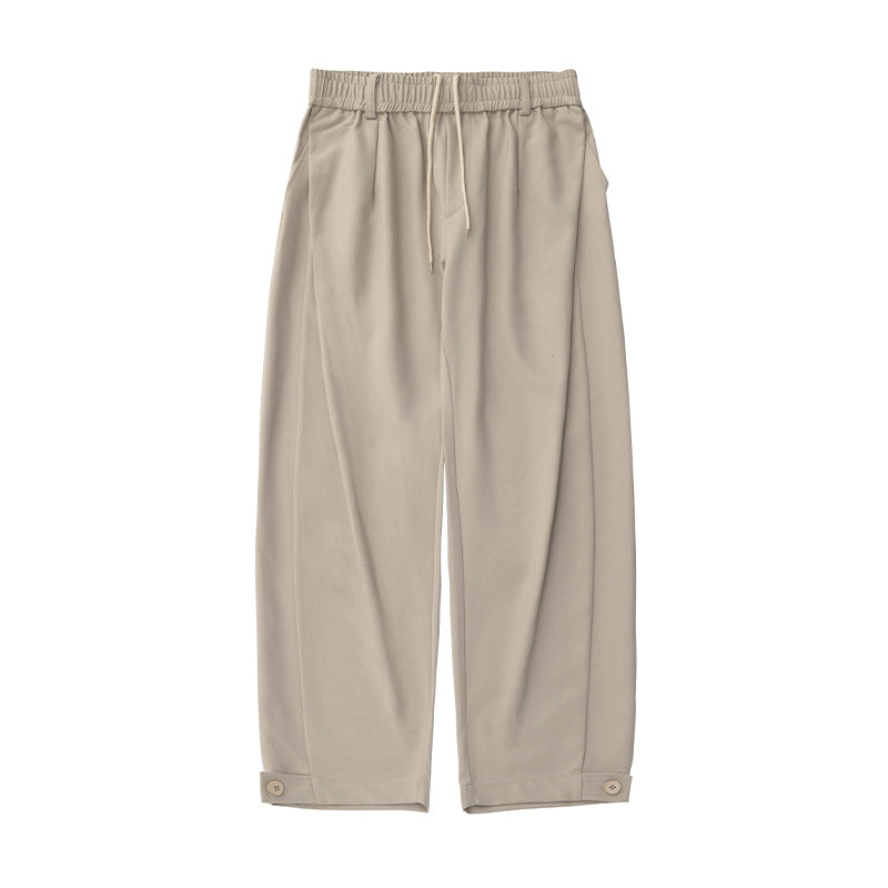 Women's wide pleat trousers with elastic waistband, drawstring and buttoned cuff Mune Fashion