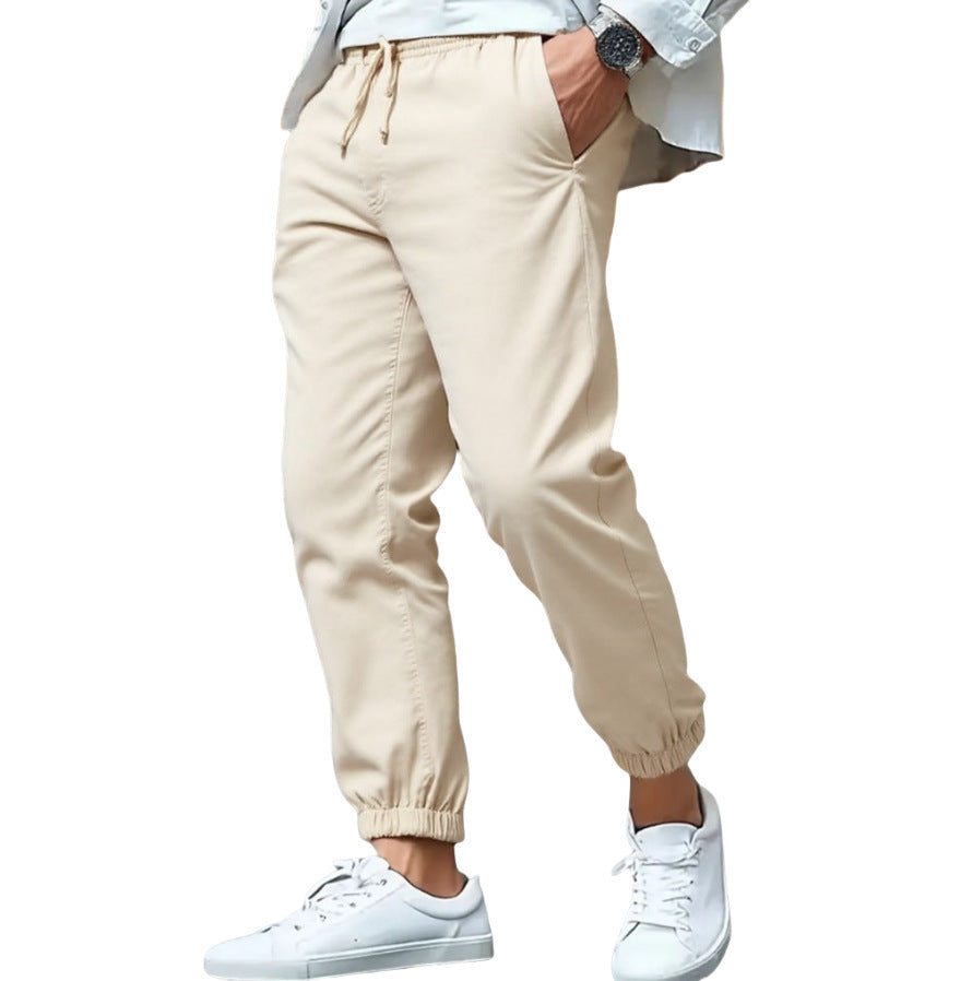 Men's nan tapered sweat joggers with elastic waistband, drawstring, and cuffed hems Mune Fashion