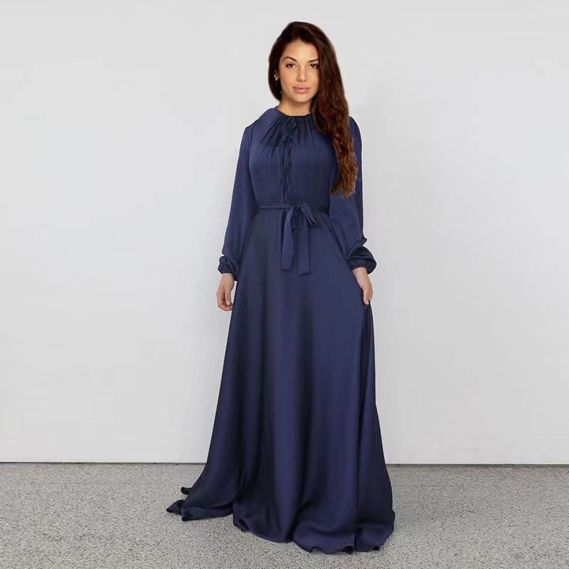 Women's maxi dress made of flowing satin with stand-up collar and tie belt Mune Fashion
