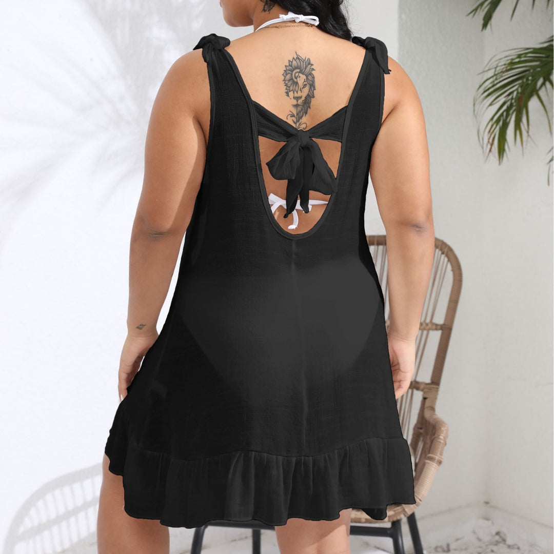 Women's casual beach dress with ruffled hem and strap detail Mune Fashion