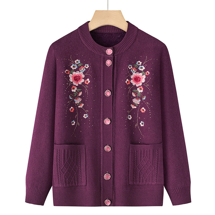 Women's embroidered cardigan with round neckline, decorative button placket, and patch pockets Mune Fashion