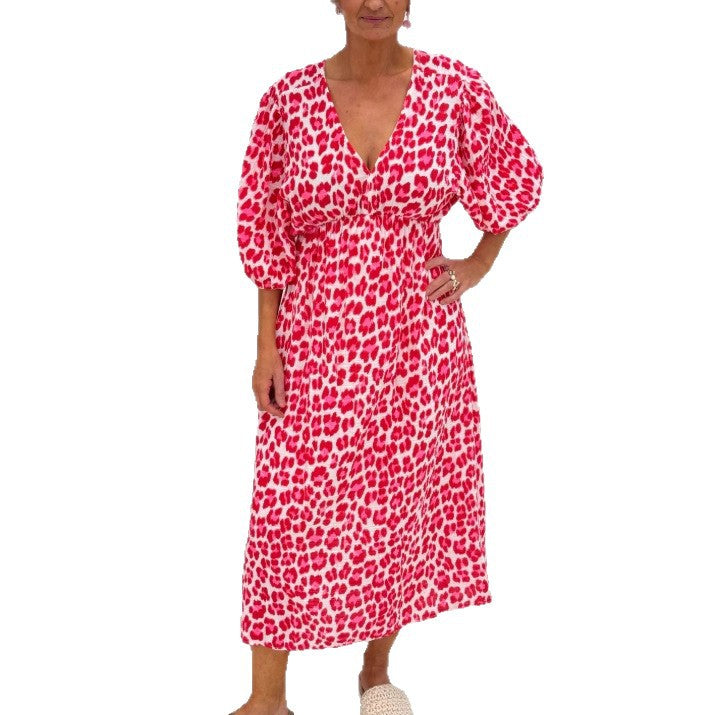 Women's maxi dress with deep V-neck, voluminous puff sleeves, and smocked waist seam Mune Fashion