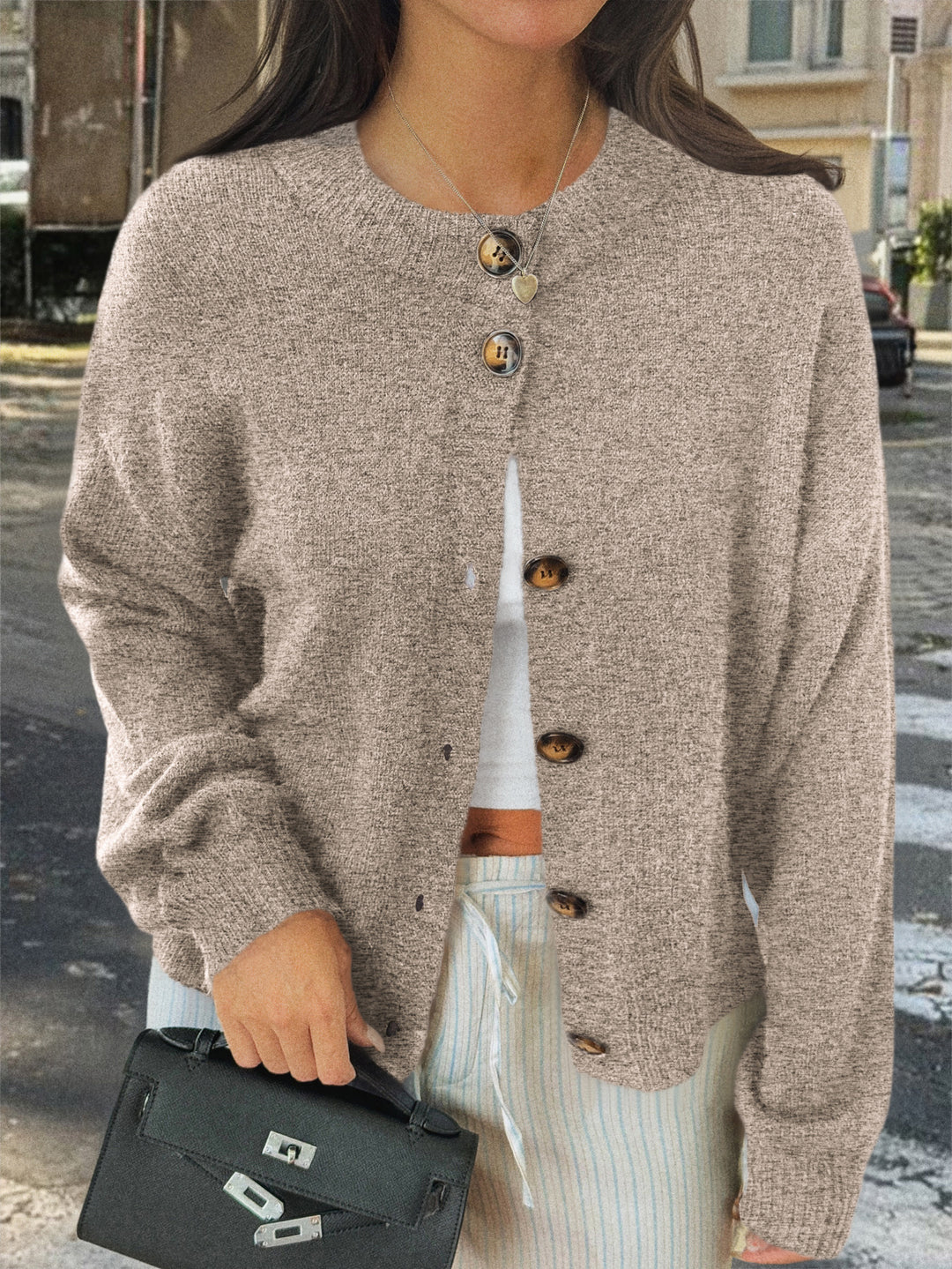 Women's cozy oversized knitted cardigan with horn button placket and round neckline Mune Fashion
