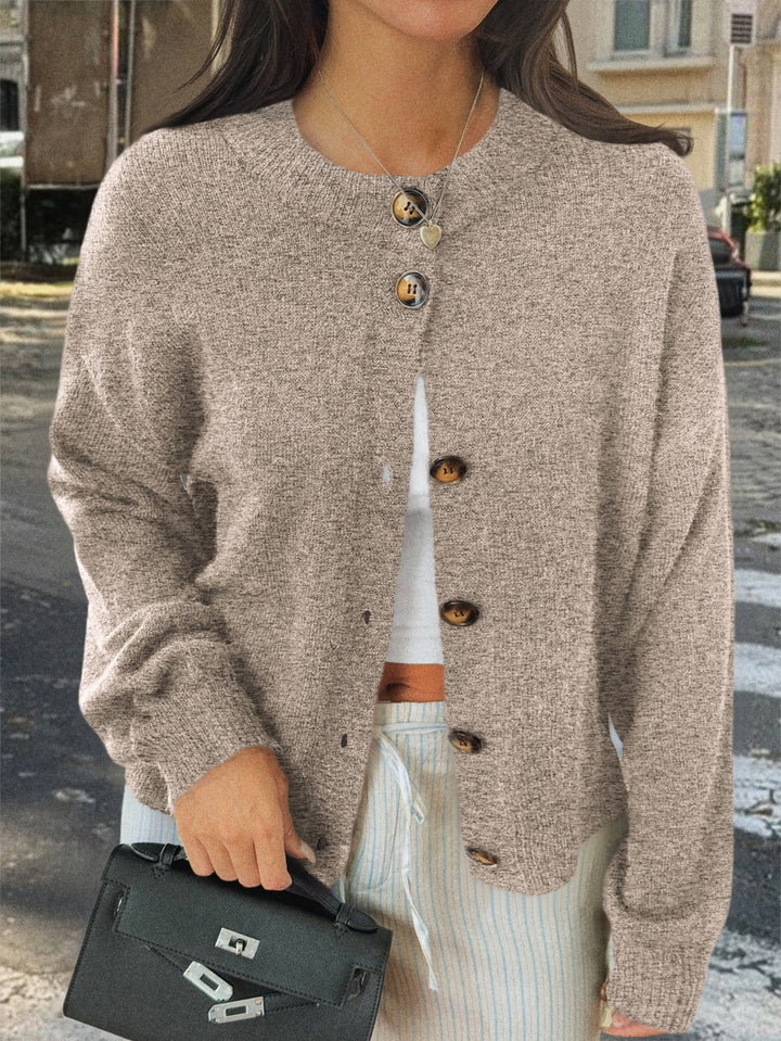 Women's cozy oversized knitted cardigan with horn button placket and round neckline Mune Fashion