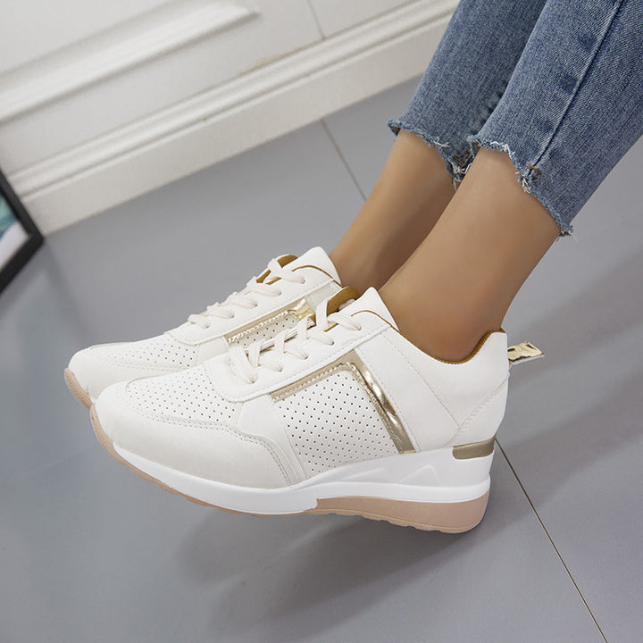Women's sporty platform sneaker with perforated microfiber upper, cushioned comfort lining, and reflective decorative stripe Mune Fashion