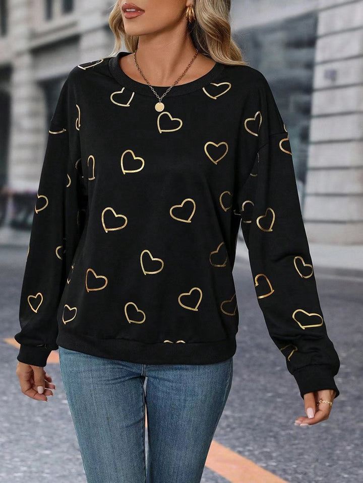 Women's loose heart print sweatshirt with round neck and ribbed cuffs Mune Fashion