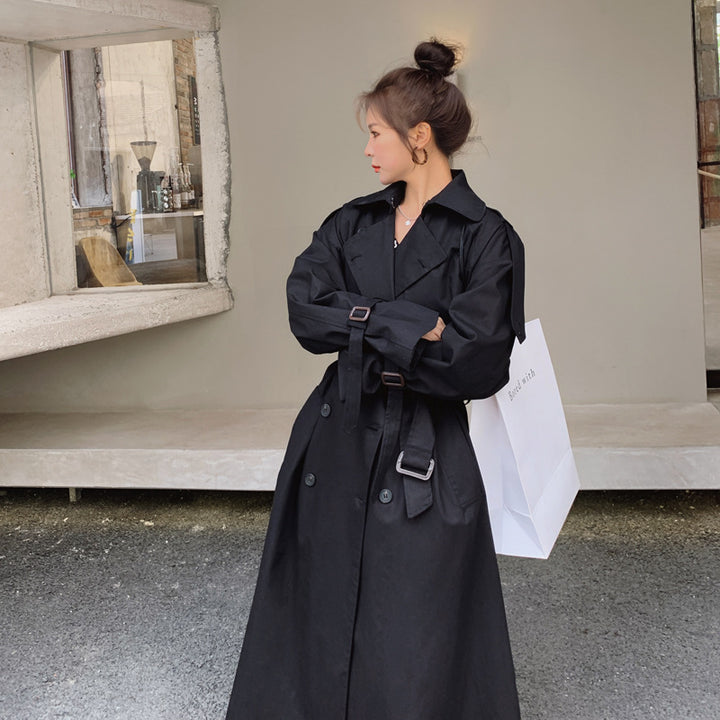 Ladies oversized trench coat with waist belt, double button placket and storm flap Mune Fashion