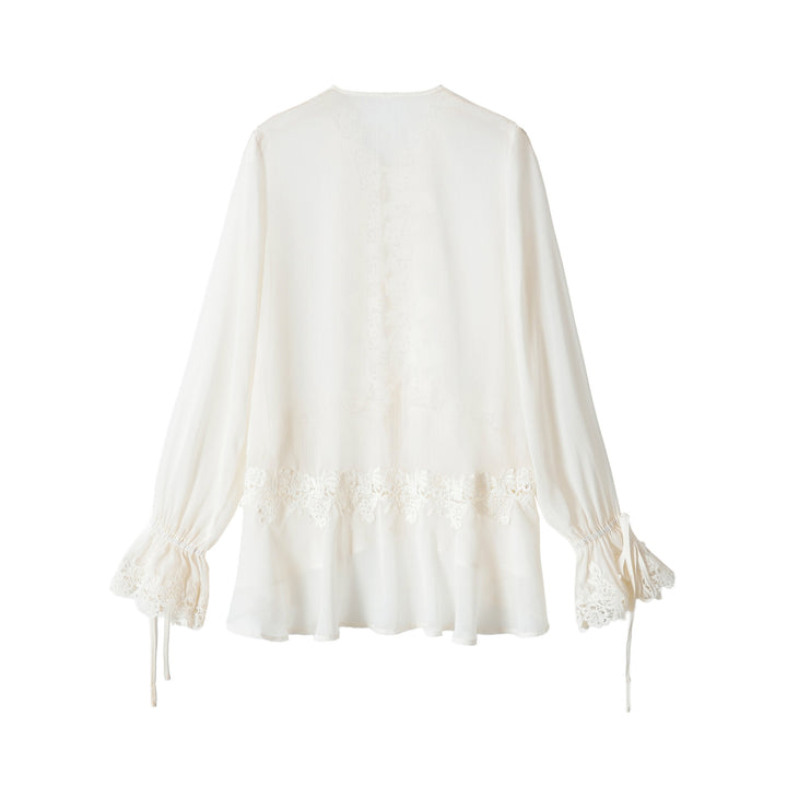 Ladies tunic blouse with lace appliqué, tying ribbons and ruffled hem Mune Fashion