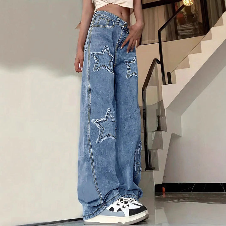 Women's extra-wide baggy jeans made of lightweight denim with star appliqués and extended silhouette Mune Fashion
