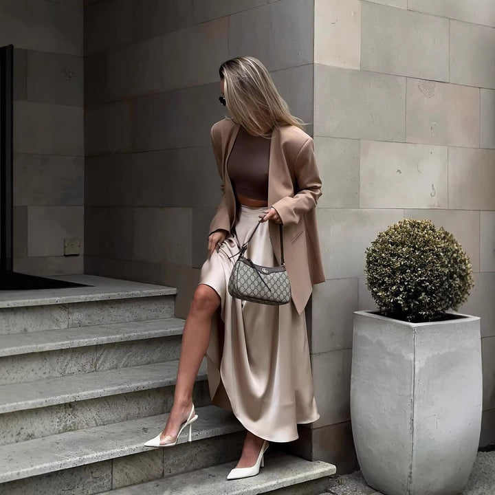 Women's Flowing Satin Midi Skirt with High Waist and Pleats Mune Fashion