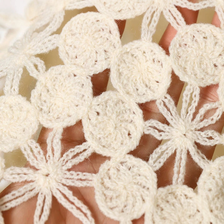 Women's crochet pullover with floral lace look, scallop hem, and delicate ribbon Mune Fashion