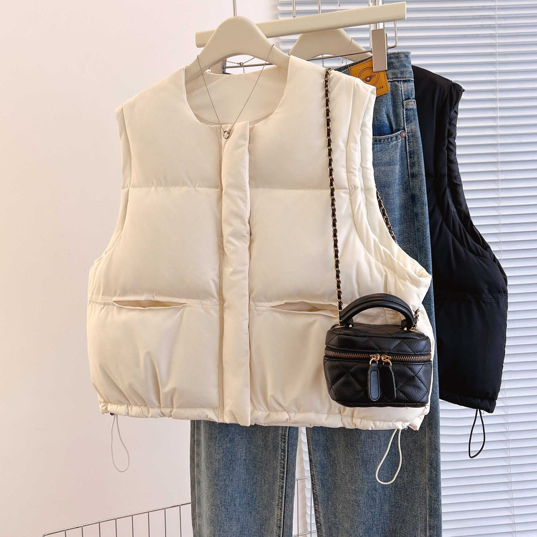 Women's short padded quilted vest with drawstring hem and round neck Mune Fashion