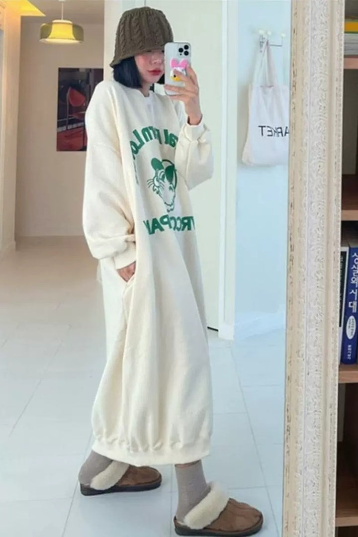 Women Long Fleece Sweat Dress with Statement Print, Side Pockets and Elastic Hem Mune Fashion