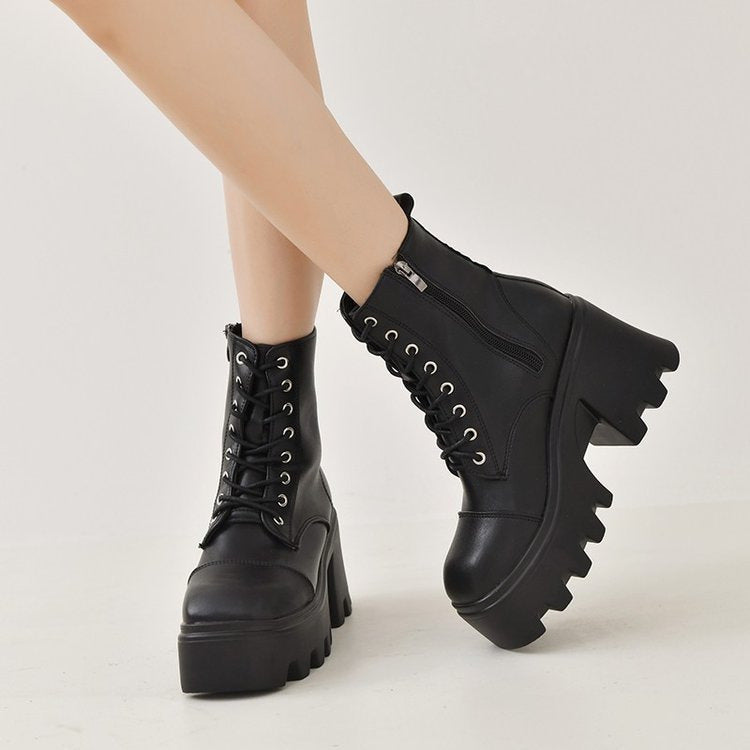 Ladies high-cut platform biker ankle boots in patent look with lacing, side zipper, and decorative buckle and stud application Mune Fashion
