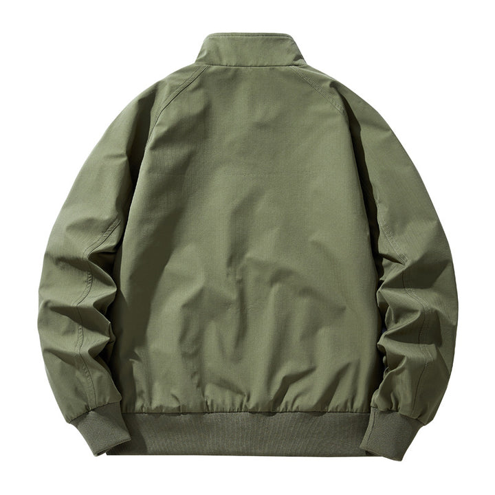 Men lightweight stand-up collar cotton blend bomber jacket with snap button neckline and diagonal seam details Mune Fashion