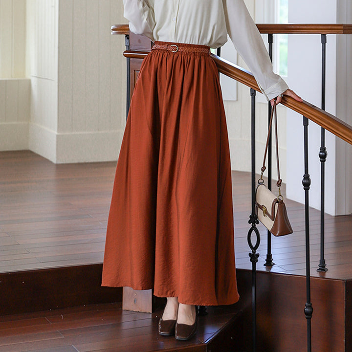 Women's flowing maxi skirt with elastic waistband and braided leather-look belt Mune Fashion