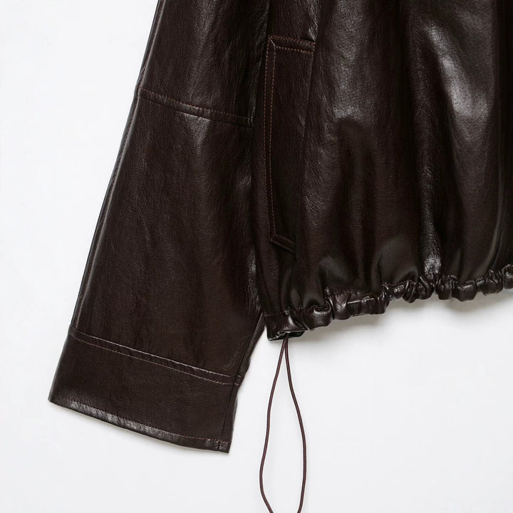 Women’s short hoodie faux leather jacket with drawstring raglan sleeves and zip Mune Fashion