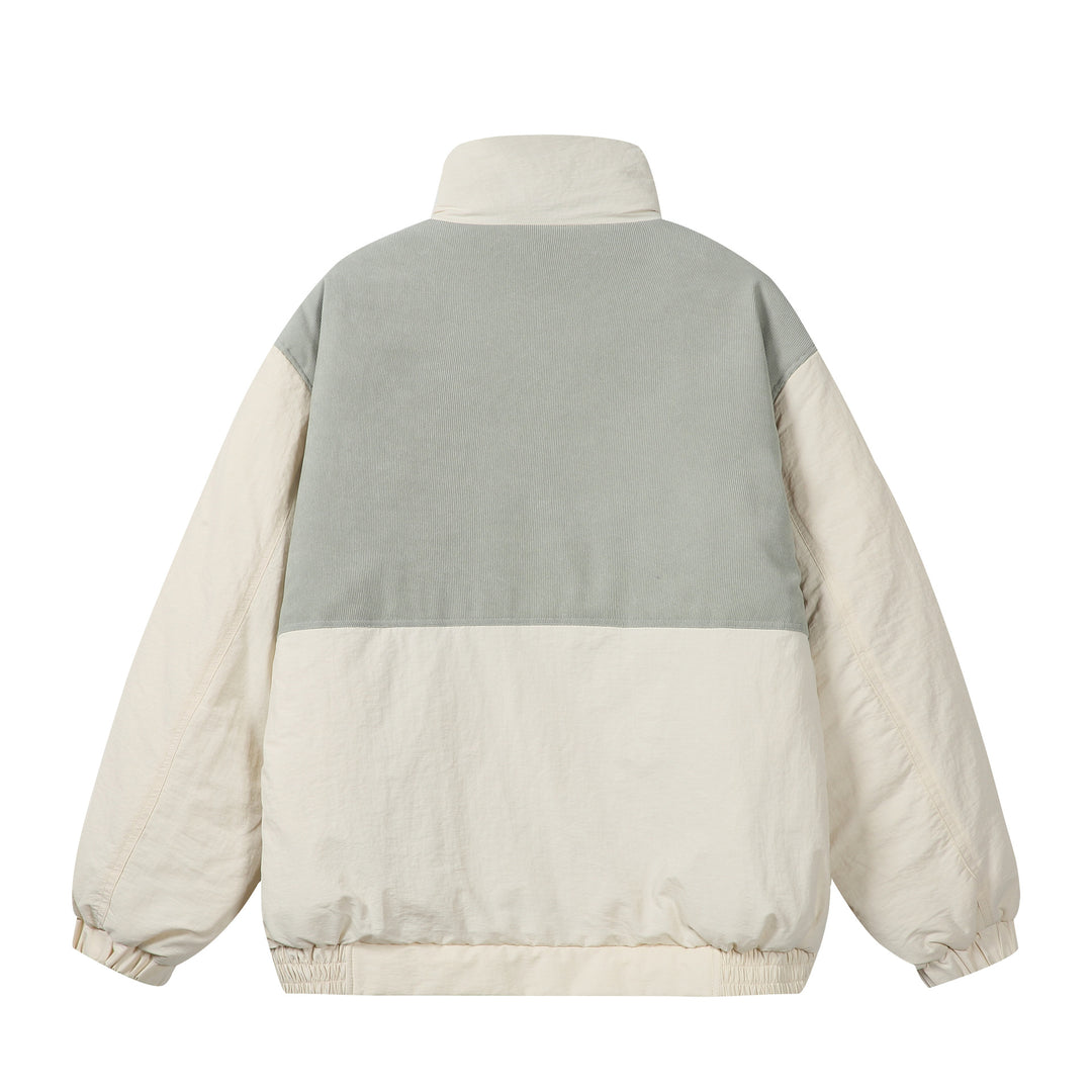 Unisex Boxy Puffer Jacket with high stand-up collar, cord shoulder yoke and large flap pockets Mune Fashion