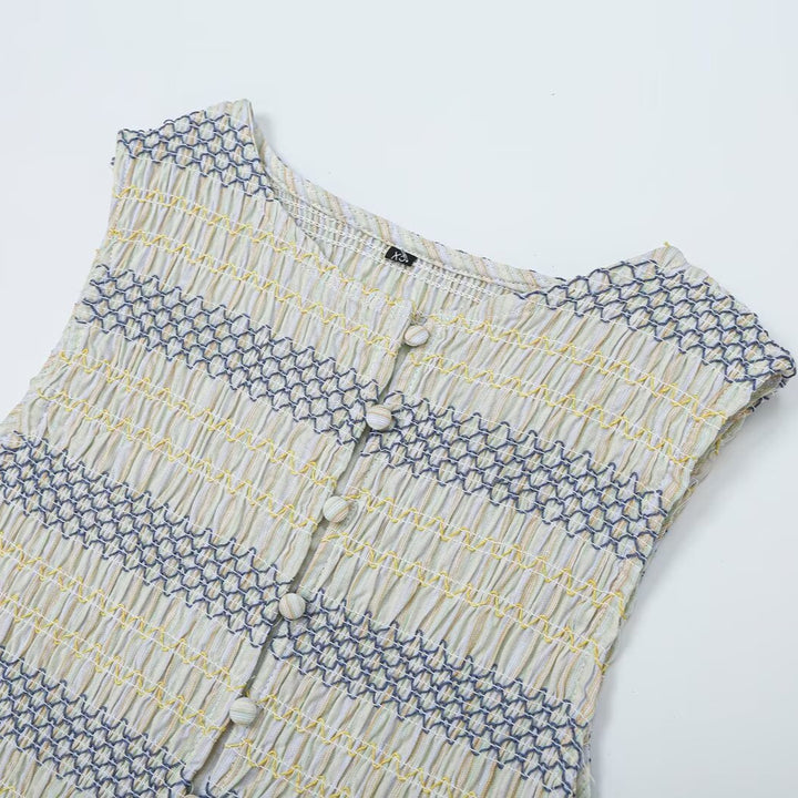 Women's gathered sleeveless top with smocked bodice, button placket, and flared hem Mune Fashion
