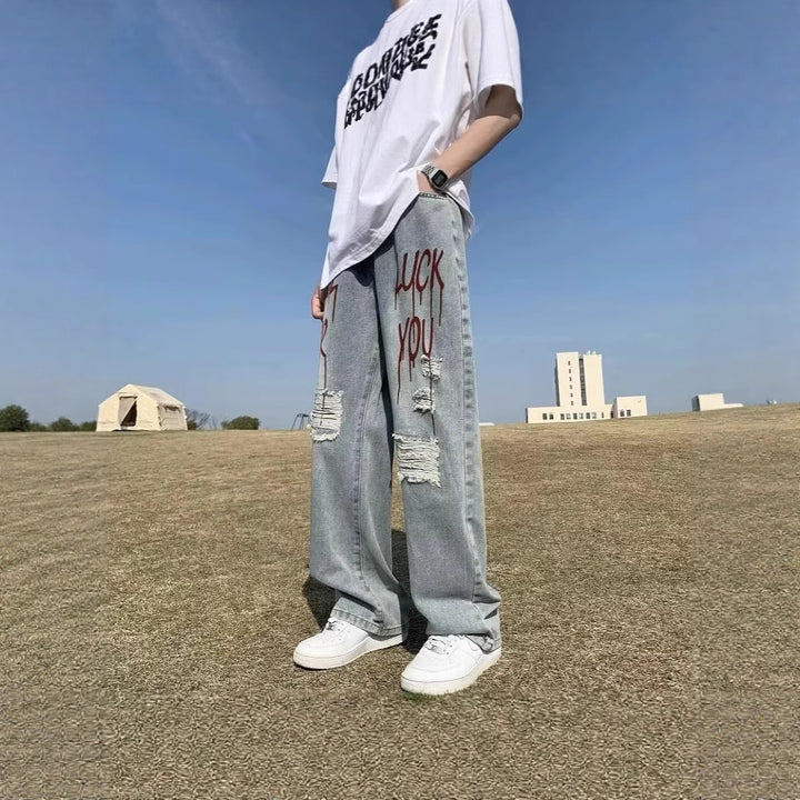 Ladies Fashion Destroyed Denim Jeans with Colorful Print Mune Fashion