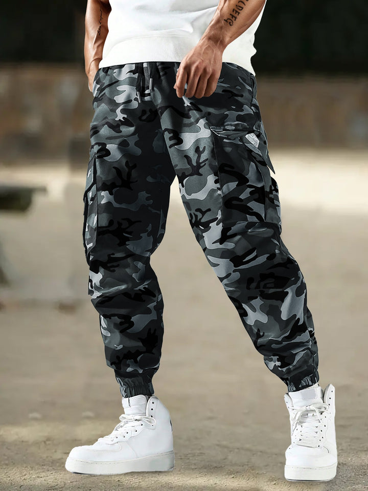 Men's cargo jogger pants with camo pattern, elastic waistband, and ankle cuffs Mune Fashion