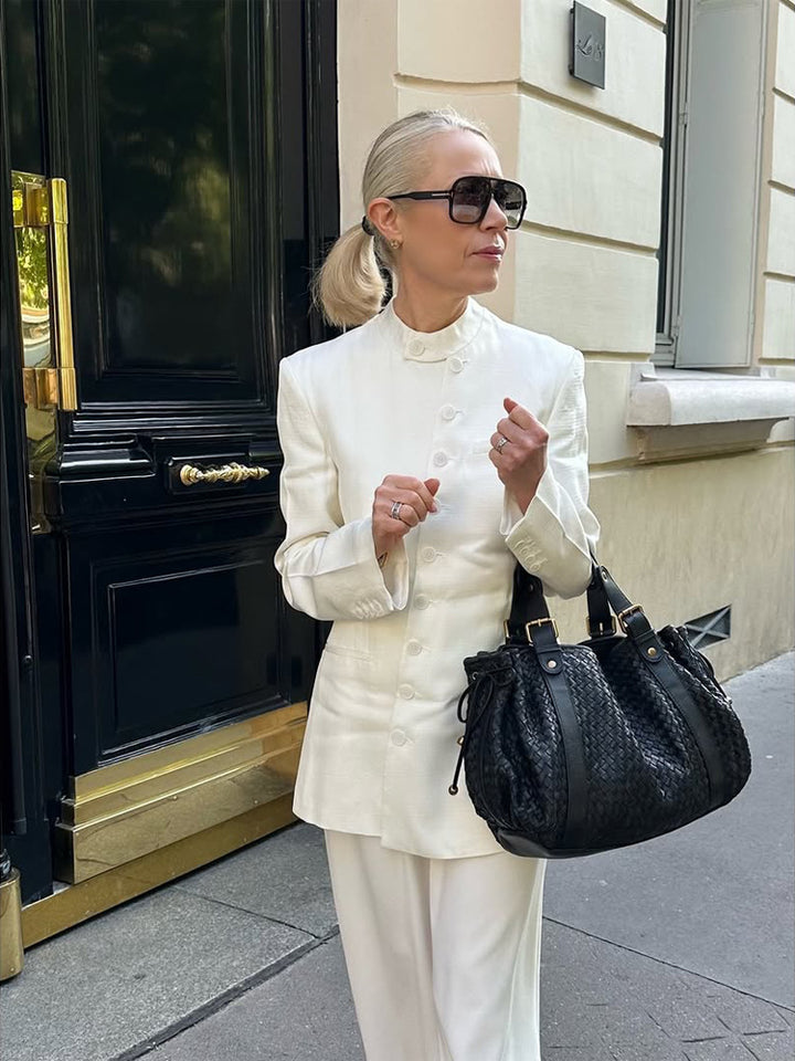Women's tailored long blazer with a stand collar, boxy shoulder, and concealed button placket Mune Fashion