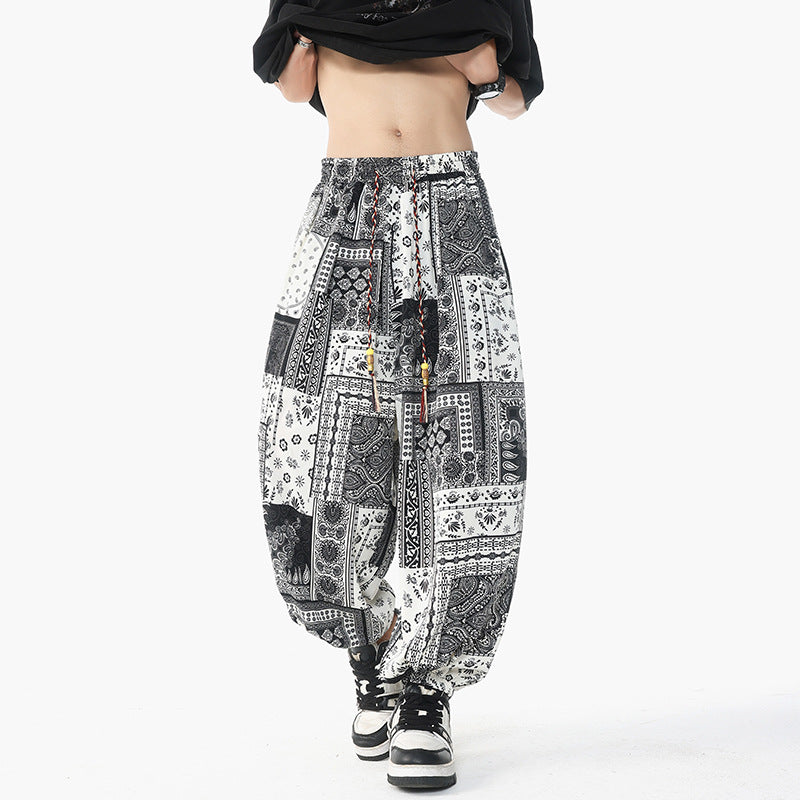 Women's casual pluder pants in ethnic print with elastic waistband, drawstring and smocked cuffs Mune Fashion
