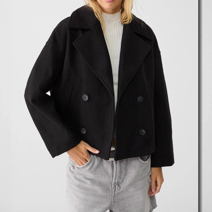 Women’s short cut double-breasted wool blend peacoat with wide lapels and boxy silhouette Mune Fashion