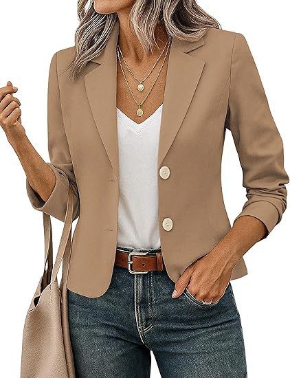 Ladies tailored short blazer with decorative buttons and three-quarter sleeves Mune Fashion
