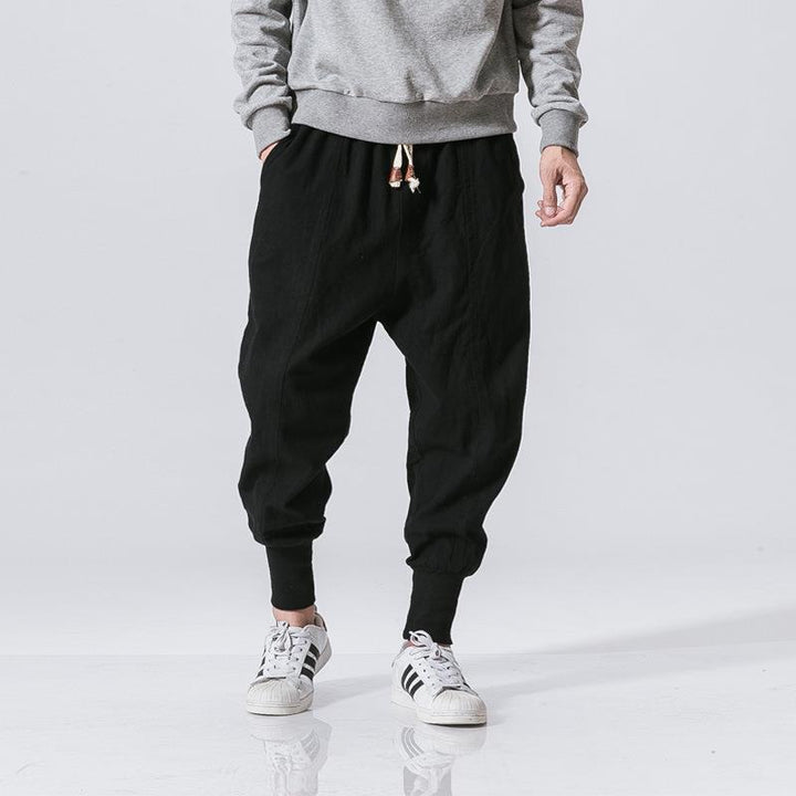 Men's wide harem pants with elastic waistband, drawstring, deep crotch, and ribbed cuffs Mune Fashion