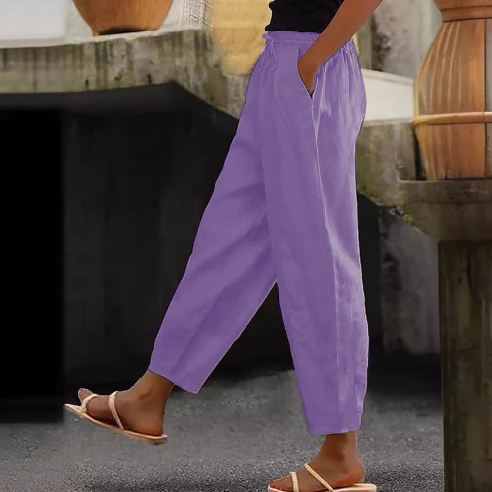 Women's loose-fitting linen blend pants with elastic waistband, drawstring, and angled side pockets Mune Fashion