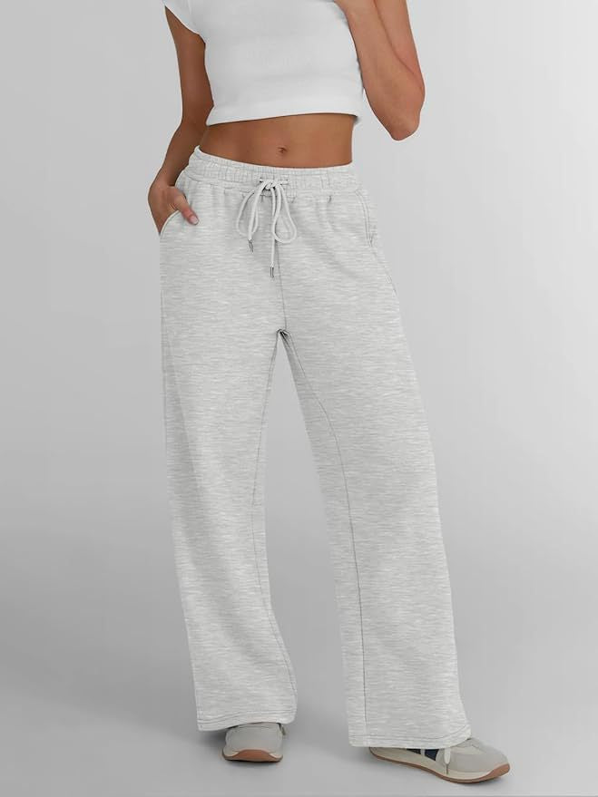 Women's wide lounge pants with high elastic waistband, adjustable drawstring and flowing palazzo silhouette Mune Fashion