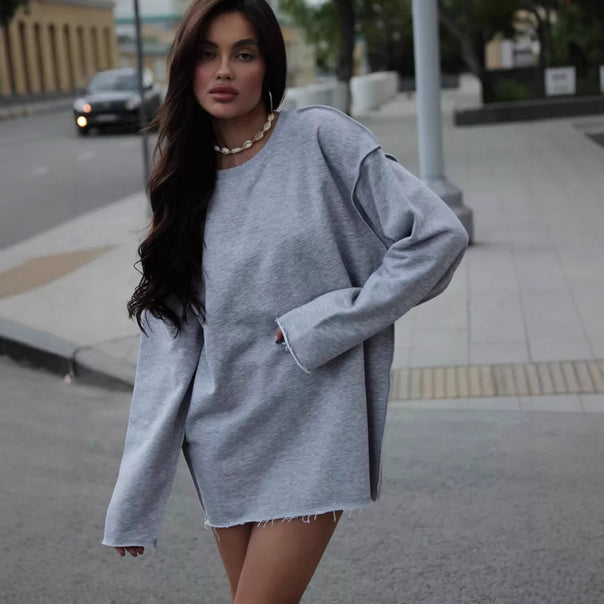 Women's oversized sweatshirt with frayed hem and extended sleeves Mune Fashion