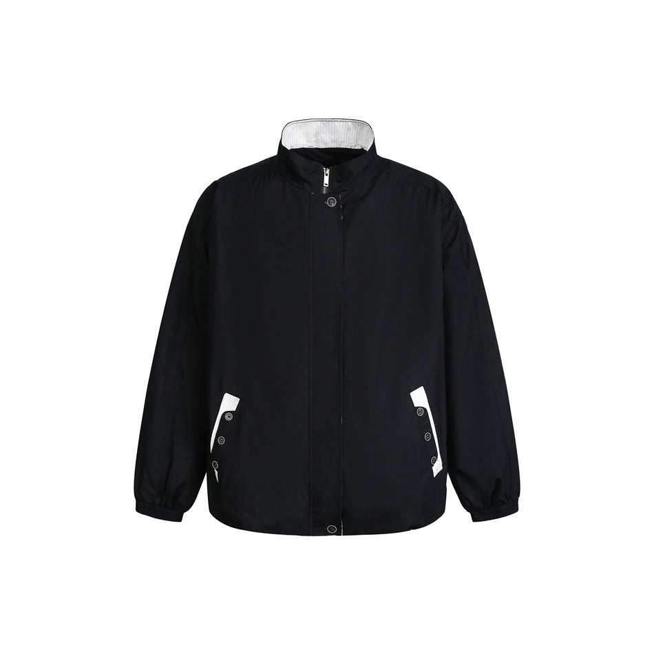 Unisex short-cut lightweight windbreaker jacket with standing collar, concealed zipper, and contrasting patch pockets Mune Fashion
