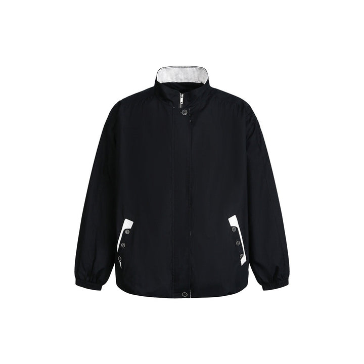 Unisex short-cut lightweight windbreaker jacket with standing collar, concealed zipper, and contrasting patch pockets Mune Fashion