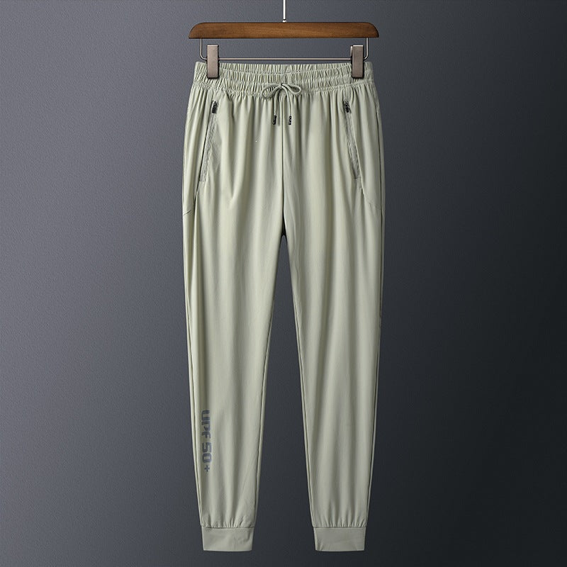 Men's sporty training pants with practical zip pockets Mune Fashion