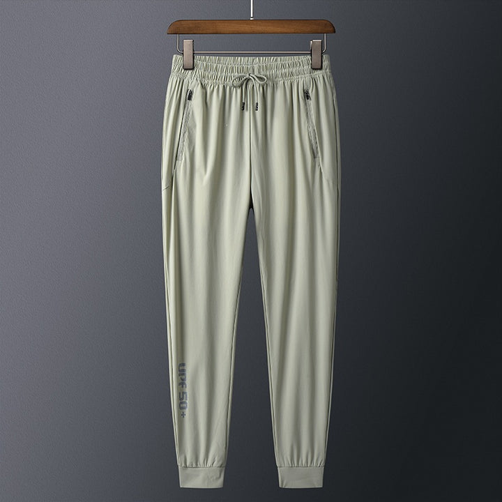Men's sporty training pants with practical zip pockets Mune Fashion