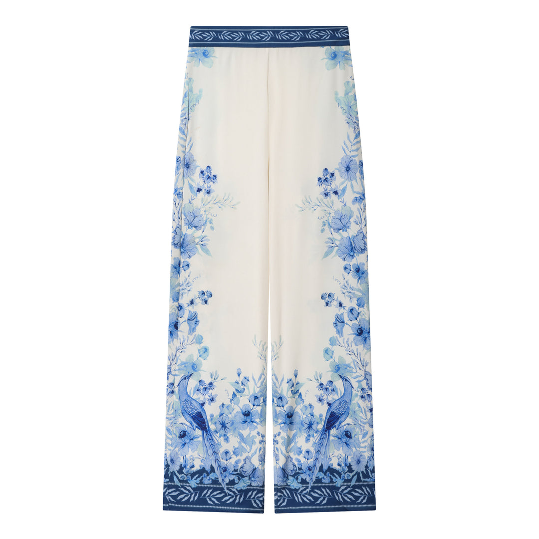Women's wide-cut palazzo pants with floral border print and elastic decorative waistband Mune Fashion