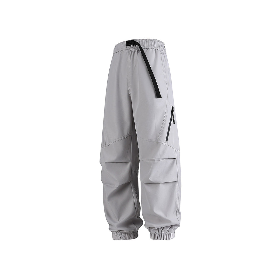 Men's loose technical cargo jogger pants with elastic drawstring waistband, patch flap pockets, and zippered leg pocket Drune