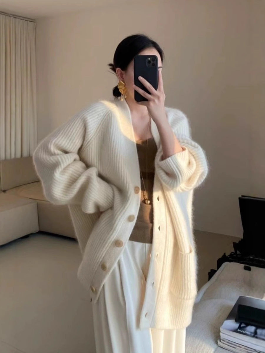 Women Long Oversized Cardigan made of soft ribbed knit with wooden button placket Mune Fashion