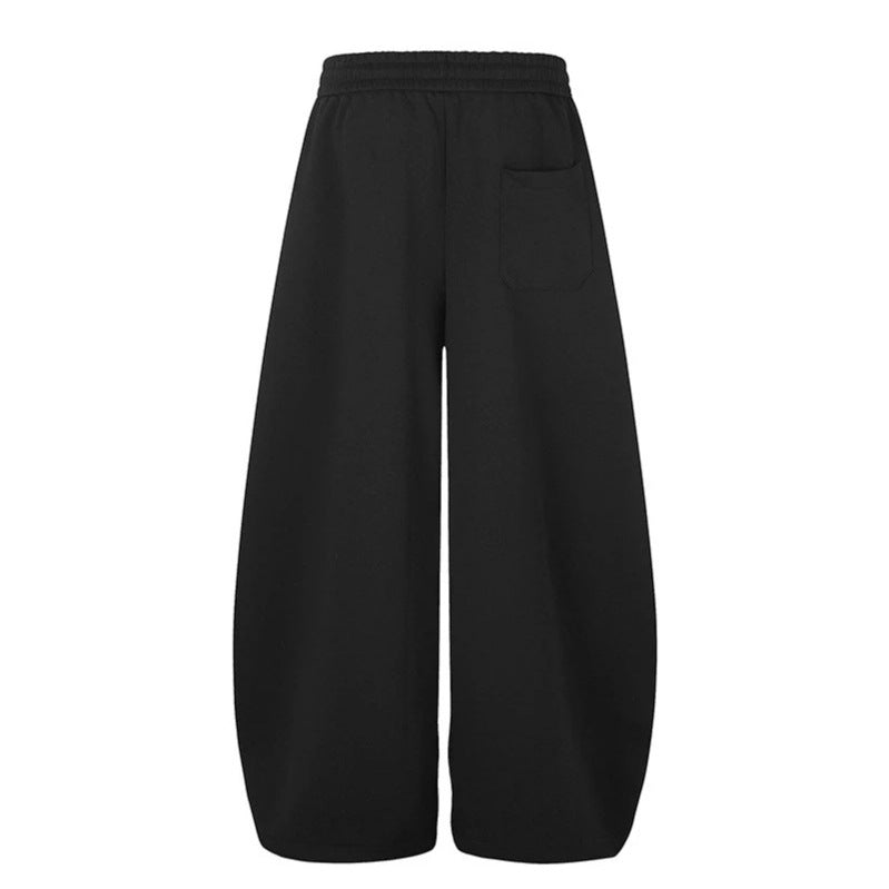 Women's Wide Midi Lounge Sweatpants in Palazzo Cut with Drawstring, Zip Hem and Statement Print Mune Fashion