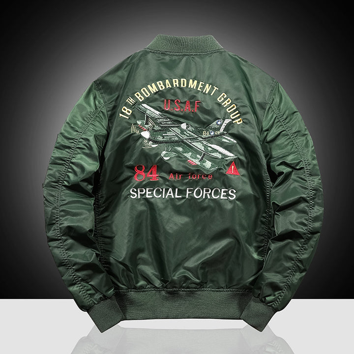 Men's bomber jacket in military patch style with sleeve utility pocket and ribbed collar Mune Fashion
