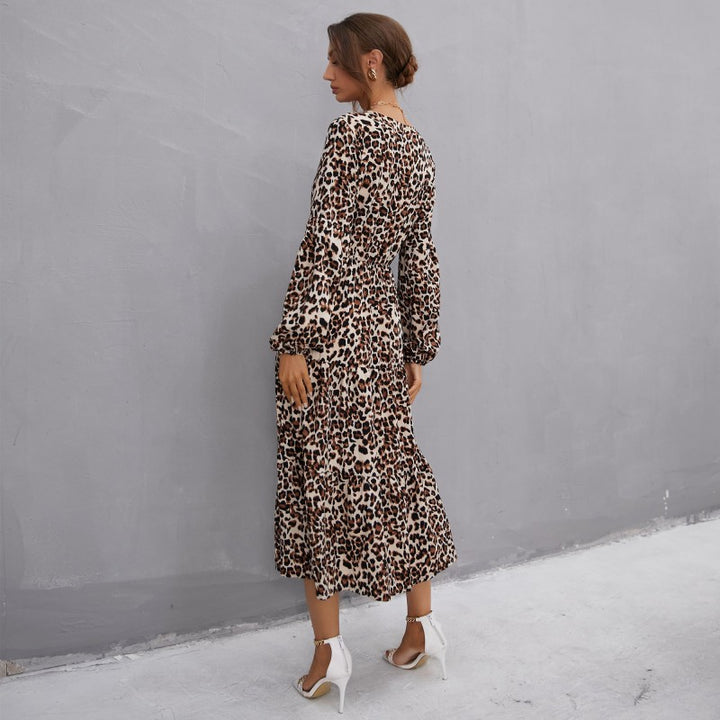 Women’s midi dress in leopard print with V-neckline, button placket, drawstring waist, and tiered skirt Mune Fashion