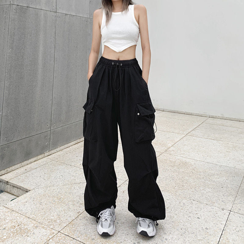 Women's wide cargo pants with tunnel drawstring, adjustable hem, and multiple pockets Mune Fashion